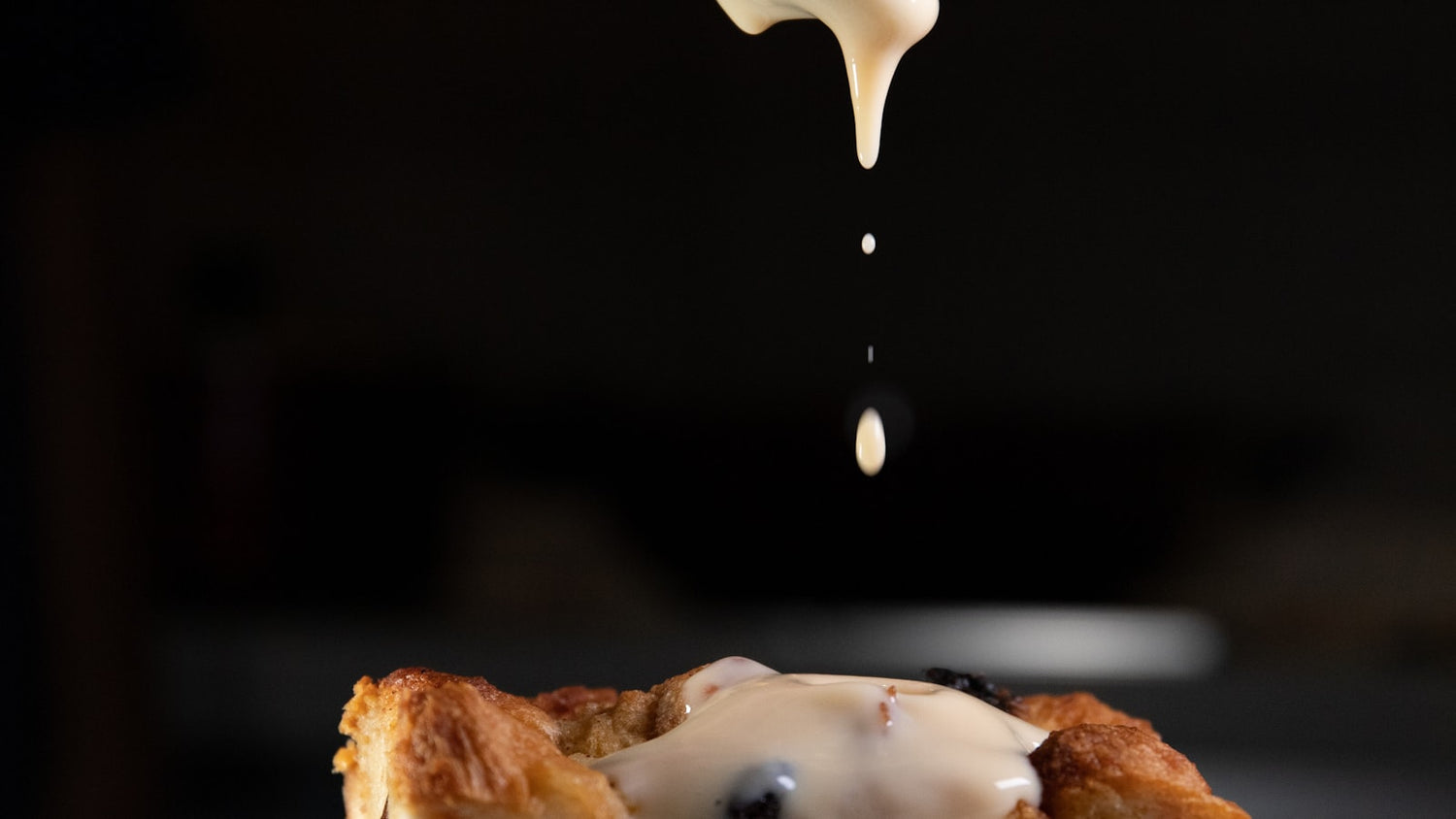 A spoonful of creamy vanilla dessert